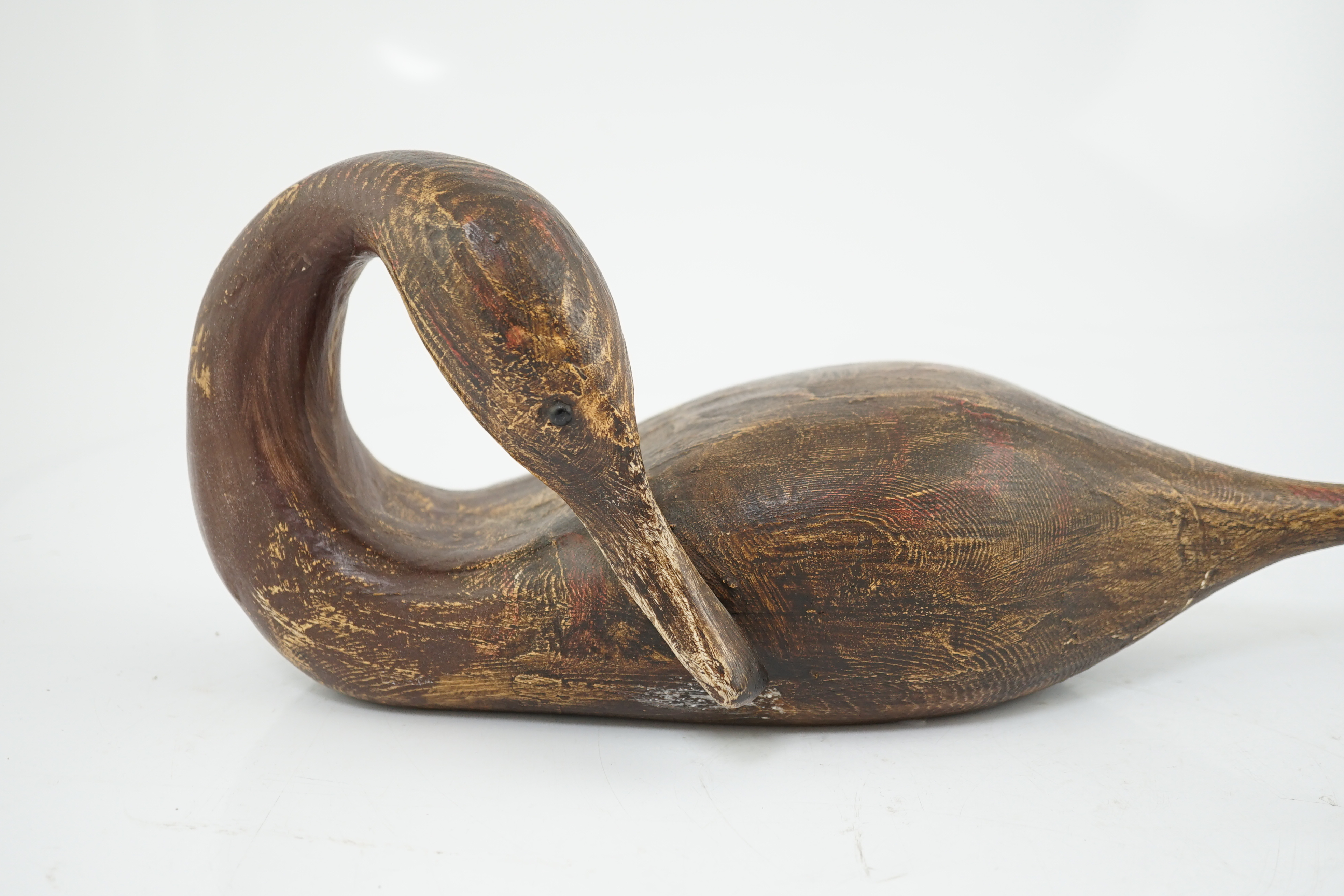 Guy Taplin (British, b.1939), a carved and painted wood figure of a pintail duck